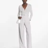 Pantaloni din bumbac cu pinteni Pantaloni din bumbac cu pinteni