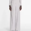 Pantaloni din bumbac cu pinteni Pantaloni din bumbac cu pinteni