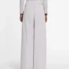 Pantaloni din bumbac cu pinteni Pantaloni din bumbac cu pinteni